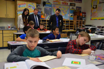 Vivian Cheng, area director of Marshall Cavendish; Greg Soldatenko, general manager of East West Math, LLC; and Peng Yim Siew, CEO of Marshall Cavendish, recently visited Todd Elementary School to observe a fourth-grade mathematics class.
