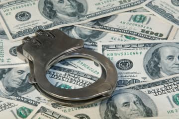 Three suspects were apprehended in the act of trying to pull off a $100,000 identity theft scheme at an auto dealership in Westchester County.