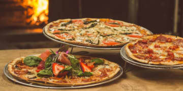 Seven pizzerias have been recognized as the best in Massachusetts at specializing in specific regional styles.