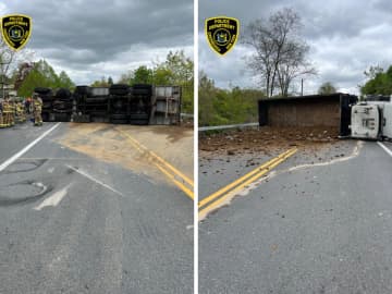 An overturned dump truck affected traffic on Saw Mill River Road in both directions in Greenburgh at the intersection with Secor Road.