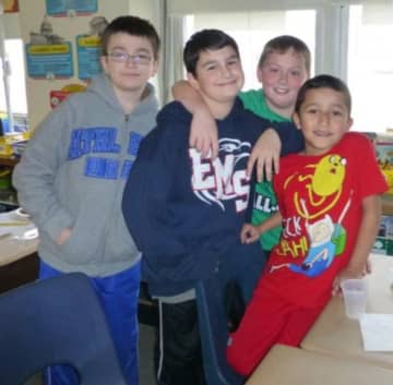Help the Anne Hutchinson School in Eastchester collect as many photos as possible to create a memory book that everyone can enjoy.