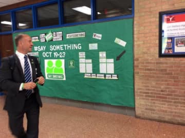 Mark Barden checks out the 'Say Something' campaign at Danbury High School last fall.