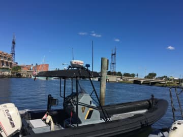 Members of the Norwalk Police Marine Unit rescued a boater who had gone overboard on Saturday.