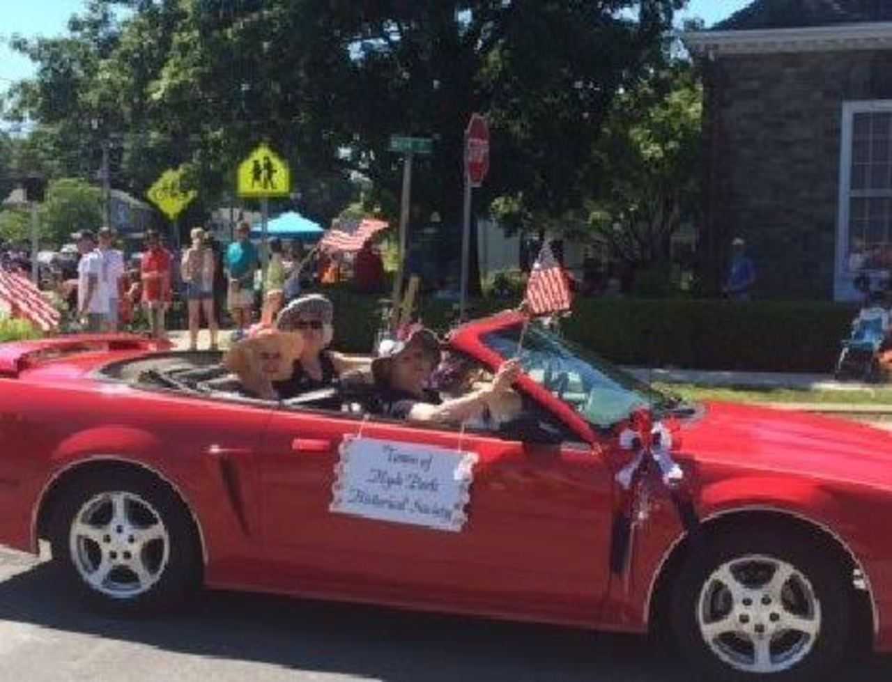 Hyde Park celebrates July 4th with a parade. Members of the local historical society are shown, Roberta Brodie, Joanne Lown, Patsy N. Costello, and Susan Schryver (driver).