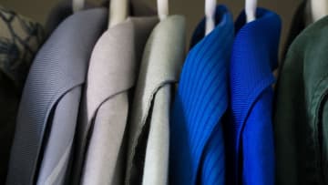 Color-coding is not uncommon in organized closets.