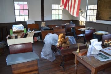 Artifacts were transferred to the Trap Fall Schoolhouse, which stayed dry.