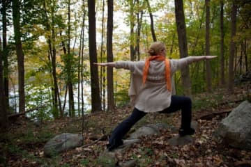 Laurice D. Nemetz, an Ossining resident and yoga teacher strikes a pose.