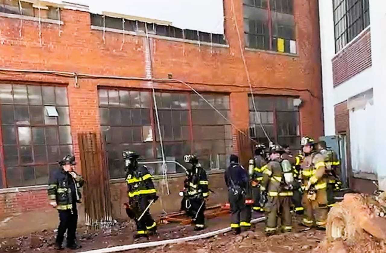 Passaic Fire Chief Patrick Trentacost and firefighters from multiple companies at Thursday's fire.