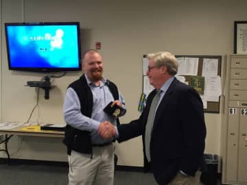 Greenwich Police Officer Jeremy Bussell has completed his investigative probation and has been promoted to detective. His badge was presented by his father, Detective Lieutenant Ronald Bussell, a veteran of the Darian Police Department.