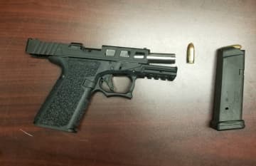The gun allegedly found during the traffic stop.