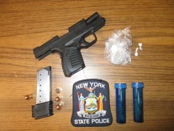The drugs and gun seized.
