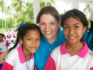 Jen Silverman of Ringwood, center, with girls shed worked with at an English camp in Thailand. 