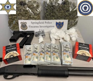 Police in Hampden County show off what they found inside the home of Hector Cabrera, 28, of Springfield, during a search on Thursday morning, March 30, authorities said.