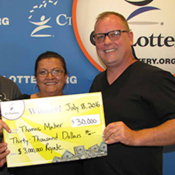 <p>Thomas Maher and his wife, Leze Zadrima, won $30,000 in the $3 million Royale scratch-off game in the Connecticut Lottery.</p>