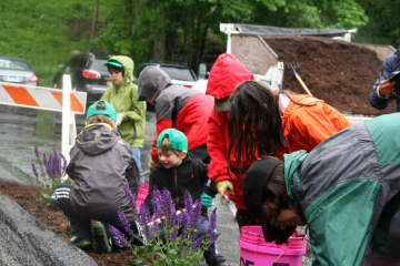 More than 100 volunteers showed up to beautify Pound Ridge on Pride Day.