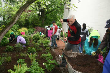 More than 100 volunteers showed up to beautify Pound Ridge on Pride Day.