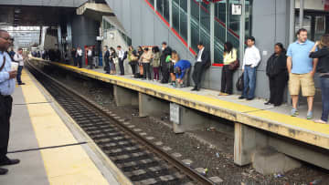 Metro-North commuters line the Stamford train platform.
