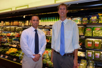Mike Picheco (left) and Tim Dolnier are the new owners of Village Market in Wilton.