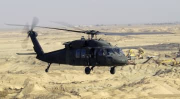 A Blackhawk helicopter flies a low-level mission over Iraq in January 2004. Blackhawk helicopters are assembled in Stratford, Conn. 