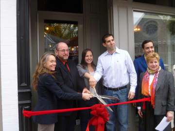 Ossining officials and owners Steven and Jessica Vescio celebrate the grand opening of Keenan House.
