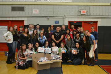 Eastchester student athletes recently shipped out supplies and letters to soldiers overseas as a part of the school's new program known as The Eagle Impact. 