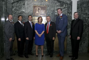From left, Mike Molinelli, Eugene Molinelli, Bruce Molinelli, Maggie Kolman-Mandle, Dick Nagle, Marty Conlon and Father Tom Collins, President of Stepinac High School.