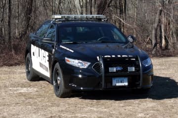Wilton police charged two residents with drunken driving on New Year's Eve.