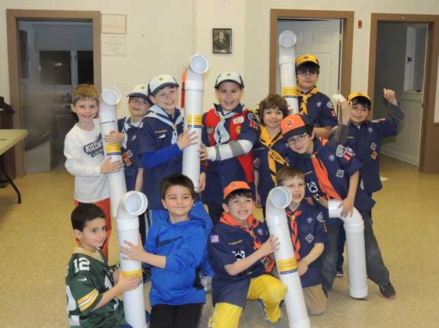 Cub Scouts made the bins with PVC pieces.