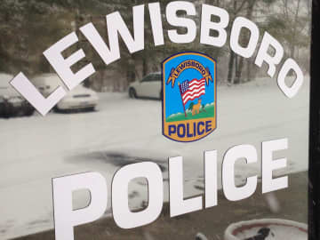 The Lewisboro Police Department is in the Cross River Shopping Center behind the DeCicco's Market. 
