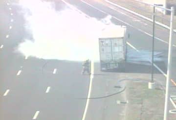 A tractor-trailer is on fire near the Darien Service Plaza on southbound I-95.