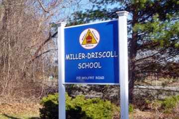 Marissa and Christopher Lowthert have filed suit against the Board of Education, Wilton school and town officials claiming that poor air quality at the Miller-Driscoll School made their children ill.