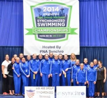 The New Canaan YMCA Aquianas pose at the eSynchro National Synchronized Swimming championships.
