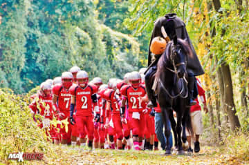 The Sleepy Hollow football team and its legendary mascot take the field for their annual showdown against rival Ossining this past fall.