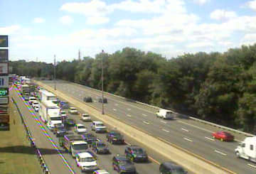 Traffic is jammed at noon Thursday on northbound I-95 in Darien and Norwalk due to a car fire. 
