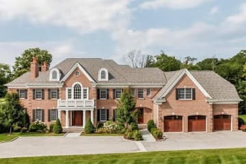 The estate of award-winning New York banker Jared Samos,  adjacent to the Winged Foot Golf Club in Mamaroneck, is being listed by Julia B. Fee Sotheby's International Realty.