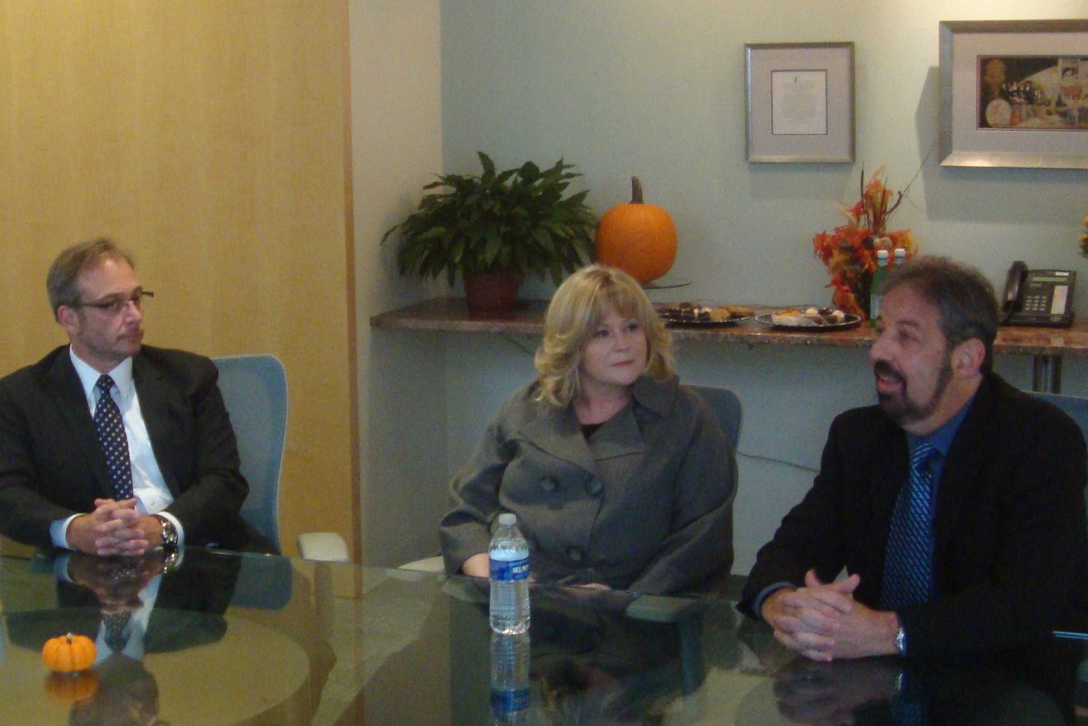 Drs. Robert Weiss, Jeanne Marconi and Michael Schwartz discuss Ebola and other common diseases during a round table talk Tuesday evening in Norwalk.