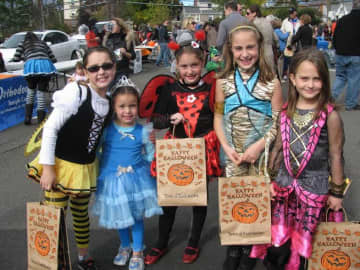 Children gathered for the Eastchester Raggamuffin parade and were provided candy and special giveaways. 