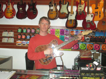Paul DeCourcey, who recently opened up a guitar shop in Peekskill.