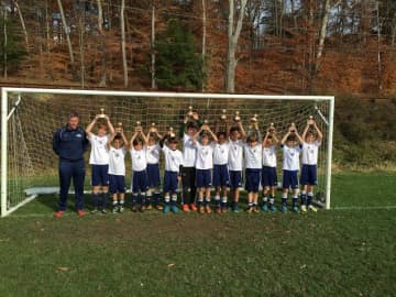The Wilton under-11 boys soccer team, which won the Connecticut Cup, added a co-championship in the Connecticut Junior Soccer Association. The team finished the season undefeated.