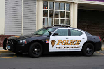 Bridgeport police have two people in custody after a chase with gunshots, the CT Post reports.