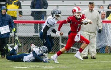 New Canaan's Alex LaPolice set a school record with a 95-yard touchdown run in Saturday's win over Wethersfield.