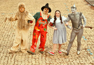 The cast of an upcoming Peekskill production of "The Wizard of Oz," at the famed yellow brick road. 