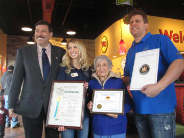 John Testa, Amber Hawxhurst, Gussie Kavanaugh and Jonathan Trager at the opening of Moe's.