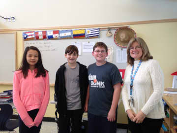 Pictured from left to right are Eastchester Middle School students Sakura Abdel-Rahman, Kevin Walsh, Austin Summer and teacher Mary Leptak.