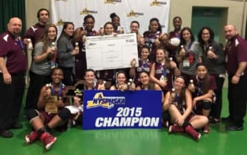 Ossining's varsity girls basketball team celebrates a third straight state title.