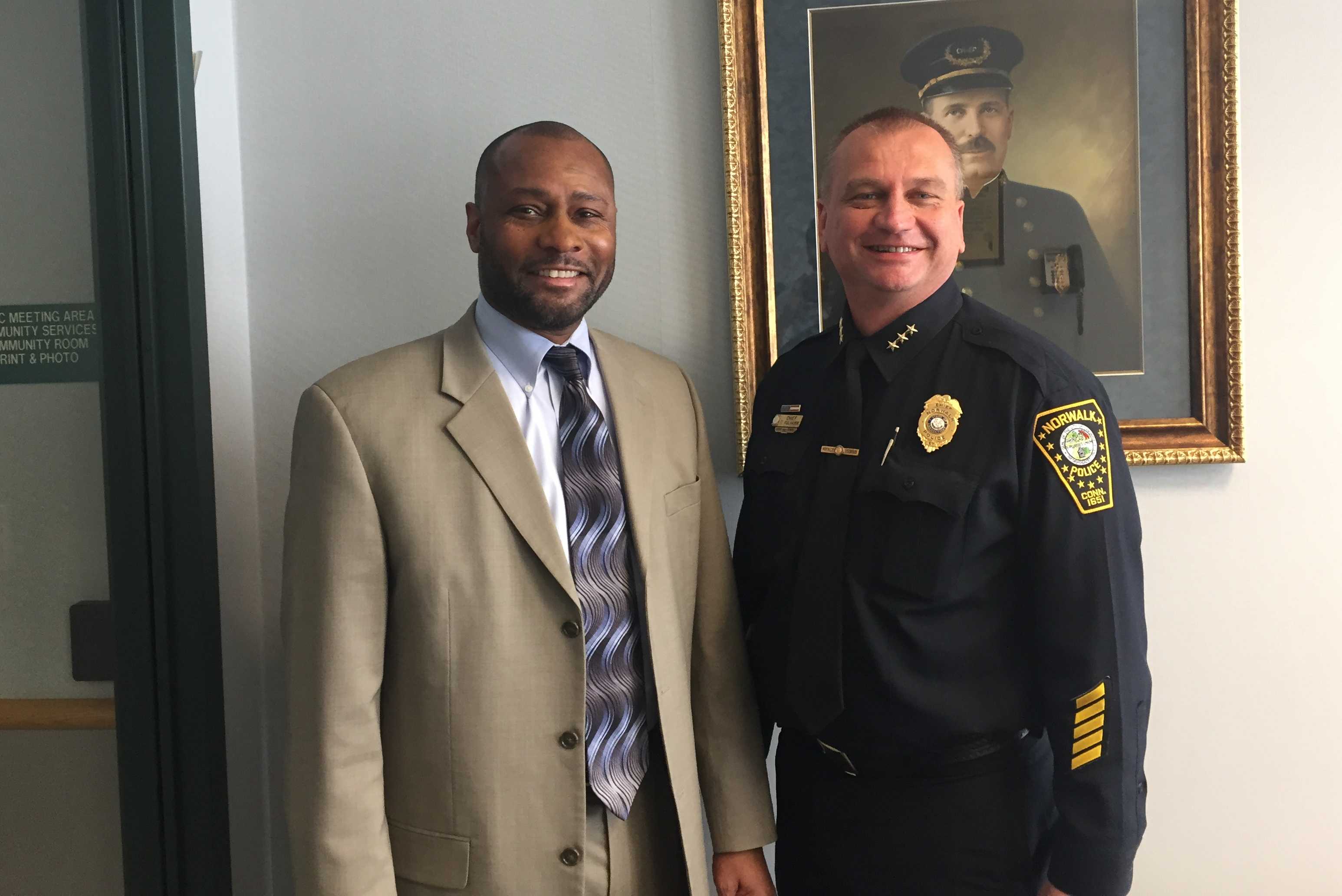 Noble Wray of Fair and Impartial Policing and Norwalk Police Chief Thomas Kulhawik.