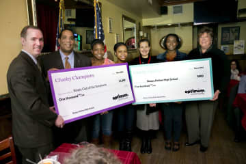 Charity Champions at Sleepy Hollow High School presented $1,000 to The Rotary Club of The Tarrytowns. 