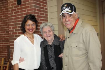 Cooking Channel personality Bal Arneson poses with residents of Main Street at The Village in New Canaan