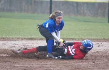 Alexis Bazos is tagged out at second by Port Chester's Marissa Arminio.