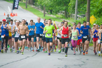 Runners take off on a previous South Salem Memorial Day 10K.